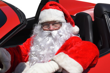 Santa Claus sitting in his brand new red sports car