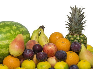 fruit on wooden table, pineapple orange, pear, mandarin, banana, plum, apple, watermelon and peach