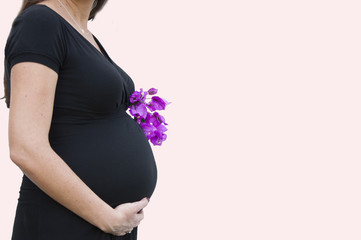 Pregnant woman with flowers 