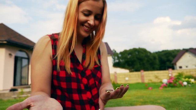 Woman flip a coin for luck. Woman Flip Coin to Heads or Tails.