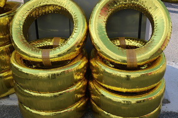 Modern golden tires pile