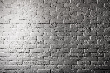 Part of a brick stone wall with illumination.