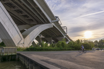 The Woodrow Wilson Memorial Bridge spans the Potomac River between Alexandria, Virginia, and the state of Maryland, as seen from Jones Point Park in Alexandria.
