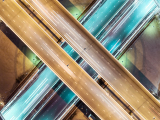 Aerial view highway road intersection at night for transportation, distribution or traffic...