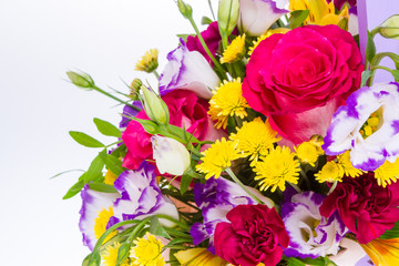 Bright buketny composition from fresh flowers, the white isolated background