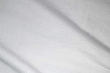 crumple white fabric of bed cover
