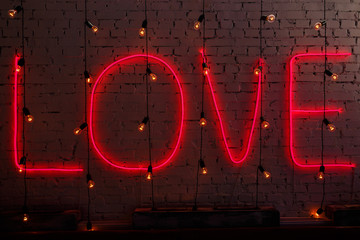 Glowing inscription love