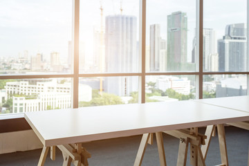 empty table in the room office and window city view background.For montage product display or design key visual layout.