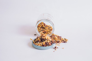 Glass jars with various grains, oats, linseed, dry seasoning