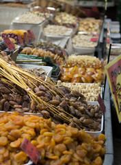Close up of market stall with dried fruit and nuts