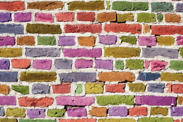 Colorful old brick wall in Finland. The colors are made using image editing software.