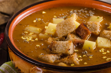 Goulash soup with croutons and potatoes