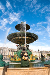 Fototapeta na wymiar Fountain on Place de la Concorde in Paris