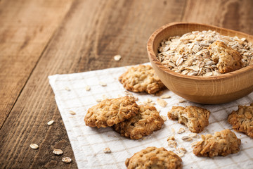 Fototapeta na wymiar Homemade oatmeal cookies and oat flakes