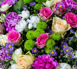 white flowers red rose violet and green flowers