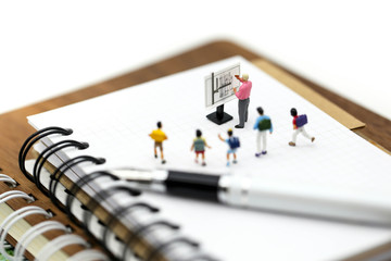 Miniature people : student and children with teacher,Match,Education concept.