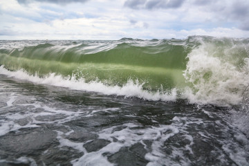 Storm waves on the seashore as a background