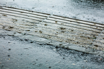 Rain on the asphalt road as background