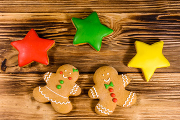 Different christmas gingerbread cookies on wooden table. Top view