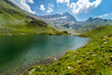 The glacie lake Schwarzkarlsee in the Austrian Alps at Nationalpark Hohe Tauern at 2119 meter in Pinzgau