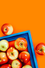 apple yellow background plaid frame blue vintage red in orange black top view above inside