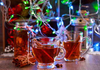 Spicy fruit drink with cinnamon stick
