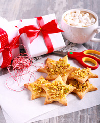 Crunchy pistachio christmas star biscuits