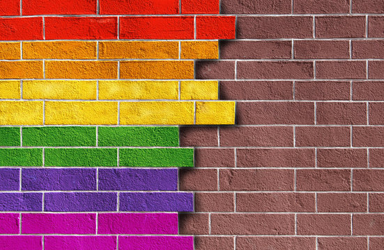 Rainbow pattern on an old brick wall