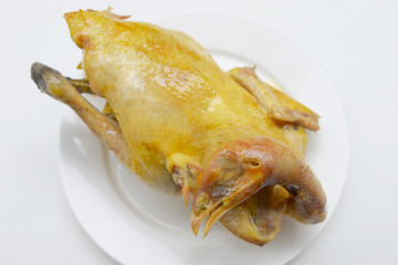 boiled chicken on a white background
