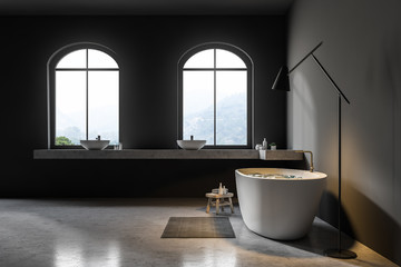 Obraz na płótnie Canvas Gray bathroom interior, white tub, side view