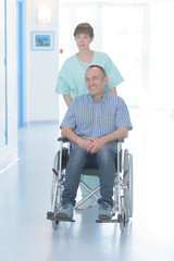 Fototapeta na wymiar nurse and patient on the wheelchair