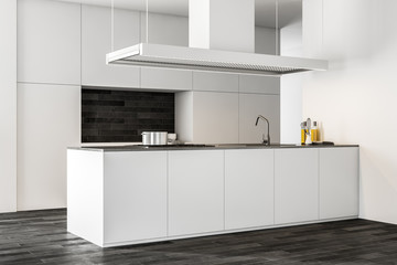 Dark wooden floor kitchen corner, white counters