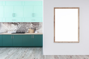 White kitchen interior, green countertops, poster