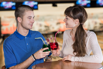 young couple having a drink