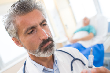 Fototapeta premium doctor with injection needle
