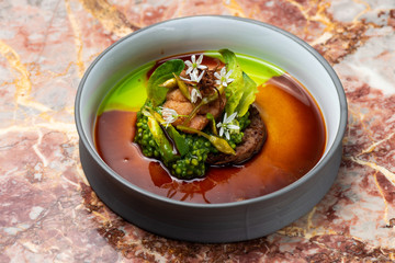 Haute cuisine, grilled Lamb steaks with a sauce of port, and vegetable