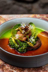 Haute cuisine, grilled Lamb steaks with a sauce of port, and vegetable