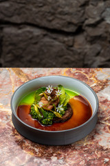 Haute cuisine, grilled Lamb steaks with a sauce of port, and vegetable