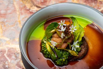 Haute cuisine, grilled Lamb steaks with a sauce of port, and vegetable
