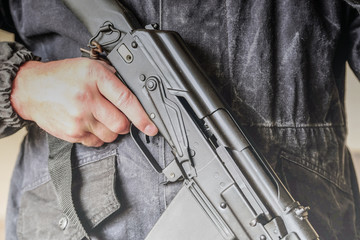 The weapon in his hands. Military, war, conflict, special forces soldiers.