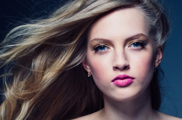 Obraz premium Beautiful blonde hair woman with beauty makeup pink lipstick