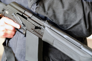 The weapon in his hands. Military, war, conflict, special forces soldiers.