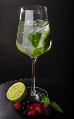 Mojito cocktail on black background