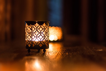 Soft candle light in a glass for decoration on the holidays 