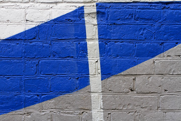 Colorful (grey, blue and white) painted brick wall as background or texture