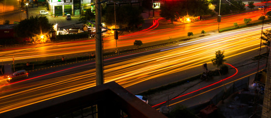 long exposure traffic trails city night view.