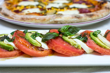 Delicious salad with tomatoes and white cheese