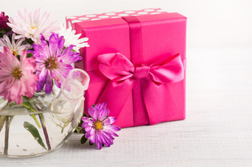 Pink purple garden flowers and gift box