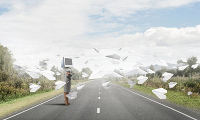Business woman with monitor instead of head.