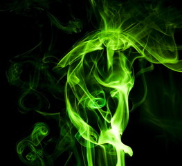 Green smoke on black background